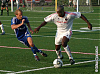 Jay Alberts and Nelson Akwari battle for the ball