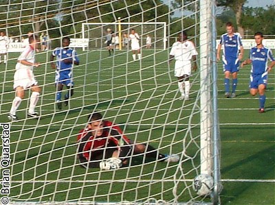 Warren watches the ball slam into the corner after Real score the first goal on a P.K.