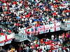 English and U.S. flags.
