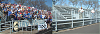 Two shots same perspective taken from in front of the supporter area