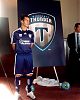 Alen Marcina models the new Thunder uniform and logo with new sponsor, Nestle Nutrition