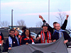 A couple of Fire fans pose before aiding us in getting the dark cloud into the stadium