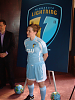 Caroline Smith models the new Lightning logo and uniform with new sponsor, CW. 