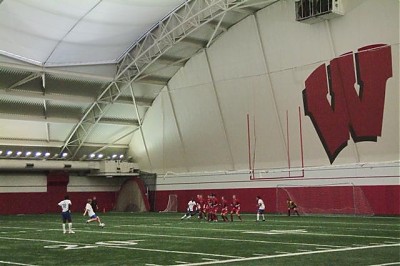 Sasha Gotsmanov takes a free kick at the UW indoor facility in Madison.