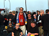 Thunder fans pose with Peter Wilt. Note the Thunder supporters scarf and the Buzz button Peter is wearing.