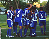 Johnny M. celebrates his goal with teammates